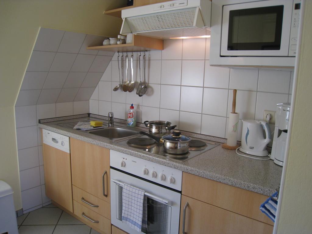 Apartamento Haus Am Deich Utersum Exterior foto
